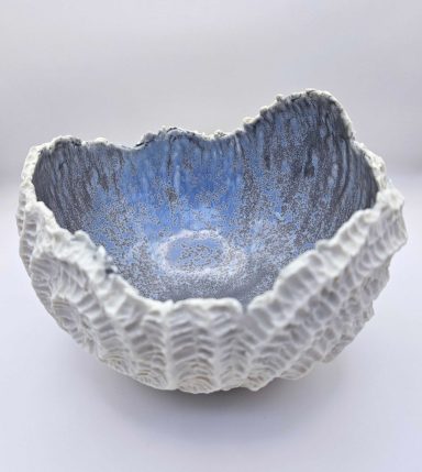 Blue and white porcelain bowl with ripple pattern